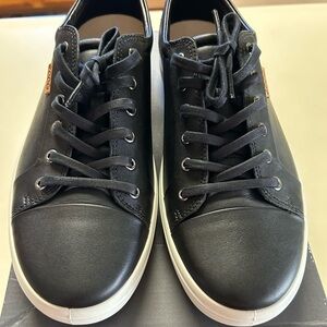 Brand new never worn black leather sneakers